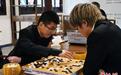 范廷钰半目胜柯洁 卫冕中国围棋“西南棋王”