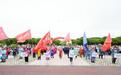 黑龙江同江：赫哲族“乌日贡”节引中外游客打卡围观