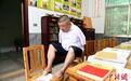 湖北崇阳“无臂斗士”刘细谷：双脚走出大爱人生