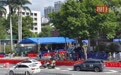高考首日直击广州华师附中考点：校门外设置水马疏导交通，有家长六点起床送考