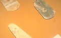 南京博物院一展台3件石钺标注有4个出处？院方回应