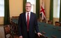 英国首相时隔8年访华，有何意图
