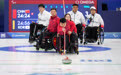 冬残奥会——轮椅冰壶混合团体循环赛：中国队胜韩国队