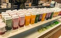 奈雪的茶部分门店五一销量环比提升超700%，纤果茶成假期“绝对C位”