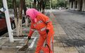 金昌"橙色精灵"为城市"梳妆" 一把笤帚扫出城市文明