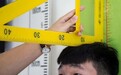 中国男女性成人平均身高分别为169.7厘米和158厘米