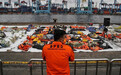 印尼失事客机搜寻工作进入最后一天 已确认29位遇难者