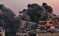 巴以冲突升级，以色列轰炸加沙地带致一大楼垮塌，两天内双方至少35人死亡