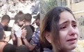 巴勒斯坦10岁女孩废墟前受访：为什么要直接发射导弹杀了我们？