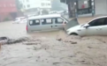 直击河南多地暴雨：洪水淹没小镇 火车被困16小时