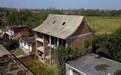 村民怀疑邻居借盖房名义建庙于是砸房 一人被刑拘