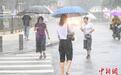 台风“暹芭”外围环流影响广州 暴雨致部分路段水浸街