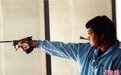 他用长了白毛的子弹，射落中国奥运首金