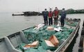 广西防城港海警查获涉嫌走私香烟11435条及冻品一批