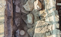 龙门石窟上新：加固维修时墙壁内发现佛头等80余件精美文物