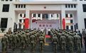 吉阳区人武部举行新营区揭牌仪式