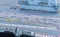 山东舰编队抵达香港，官兵在甲板排出“国安家好”字样