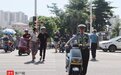 电动车违法、摩托车入市被严查 海口交警提醒：过渡期车辆及时注销