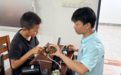 赣州职业技术学院“红电筑乡先锋队”走进大余县梅山村开展家电检修志愿服务