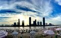 一江活水如何带火“夏日经济”？南昌龙沙湾露天泳场解锁城市亲水新图景