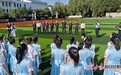 世界冠军走进甘肃校园　与小学生对拍分享“乒”搏故事