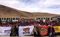 橄榄公社文化公益组织等为西藏偏远地区小学生送暖冬