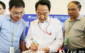 蒋建国看望人民日报、人民网博鳌论坛报道组