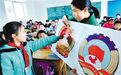 两会知识走进校园