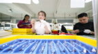 江西余江：百年匠心“镜”见未来——从“一副担子”到“智造高地”