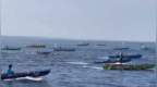 5艘商业渔船载约200名平民从菲律宾驶向黄岩岛海域，中方回应