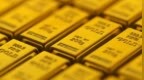 避险资产黄金走弱，黄金相关ETF早盘跌近2%