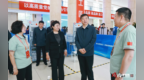 孙成坤在黑龙江技师学院调研