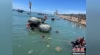 台风“蝴蝶”致海南乐东渔港内17艘渔船被打翻沉没
