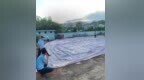 举报人获奖1000元 万宁万城镇快速查获一大型孔明灯并销毁