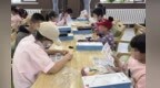 兰州新区暖心护童　这些娃领到助学金