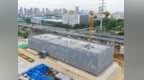 龙烟市域铁路首座高架站综合站房主体结构封顶