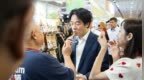 赖清德吃狗粮，还称赞“味道很棒、很香”