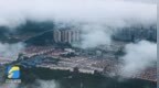 枣庄：雨后放晴云雾缭绕 城市若隐若现美如画卷