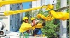 九江：迎高温奋战一线保电力护企生产（图）
