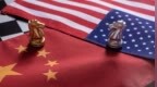 英媒：为什么世界更相信中国而不是美国
