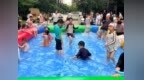 安徽长丰（双凤）经开区金海社区：水枪大战“降”酷暑 安全知识“润”童心