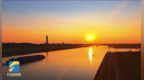 枣庄台儿庄落日熔金映运河 夏末暮色入画来