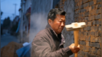 山亭张锡同：铁锤砸开生死墙，浓烟里救出九旬翁