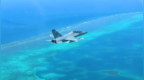 南部战区在黄岩岛领海领空开展战备警巡