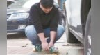 南昌“街头清障哥”李运华9年坚持清理“马路暗器” 超10万网友点赞