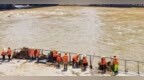 遂川县：水退人进清淤忙（图）