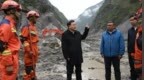西藏自治区党委书记胡昌升到泥石流核心受灾区，向遇难人员默哀
