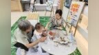 临沂：双节氛围浓 营业厅内推出节日暖心服务