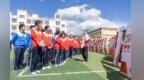 奥运冠军走进甘肃夏河中学校园　这样勉励学子