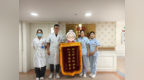 洞察隐匿病情 守护如伴亲人｜患者出院前送锦旗致谢脑科团队